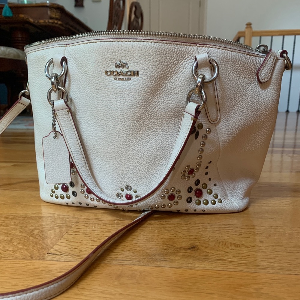 limited addition white coach purse with red jewels